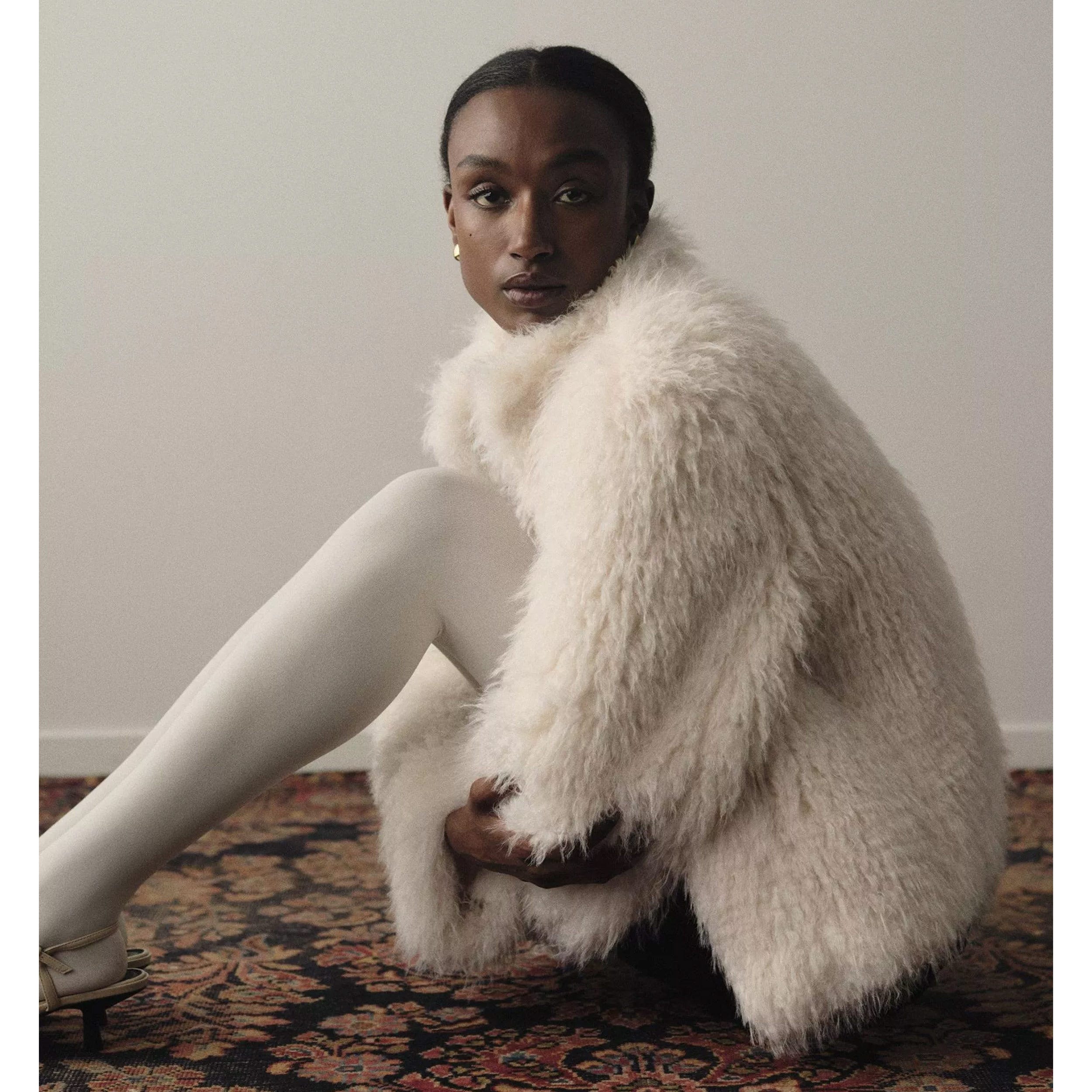 Manteau fausse fourrure